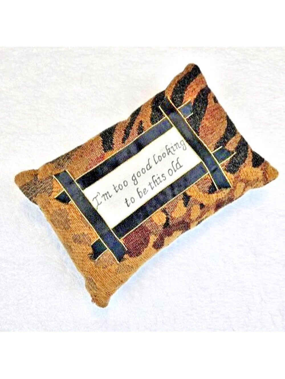 Woven Tapestry Accent Pillow (Unbranded) features and animal-print pattern.
